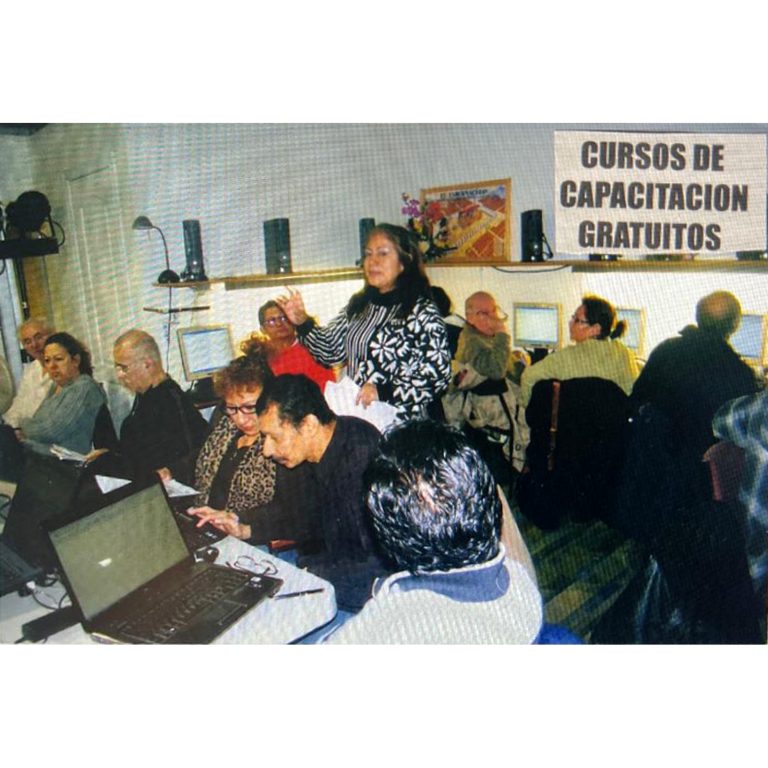 Adults participating in a community computer training session